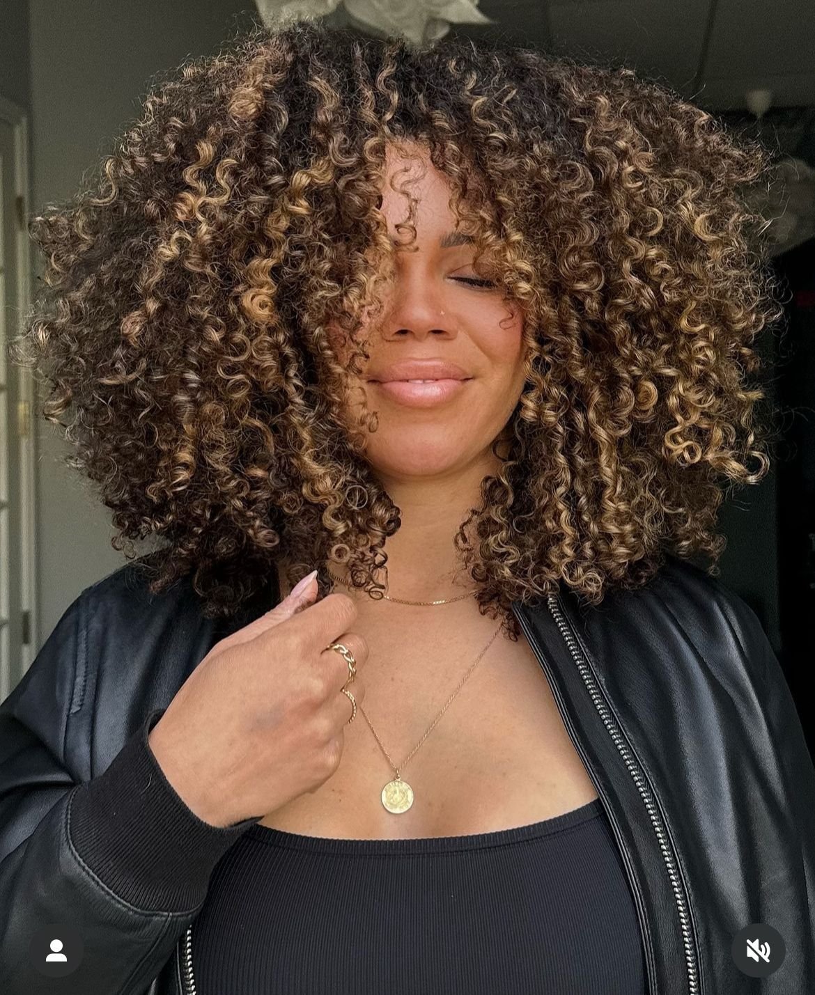 Voluminous Curly Hair Look