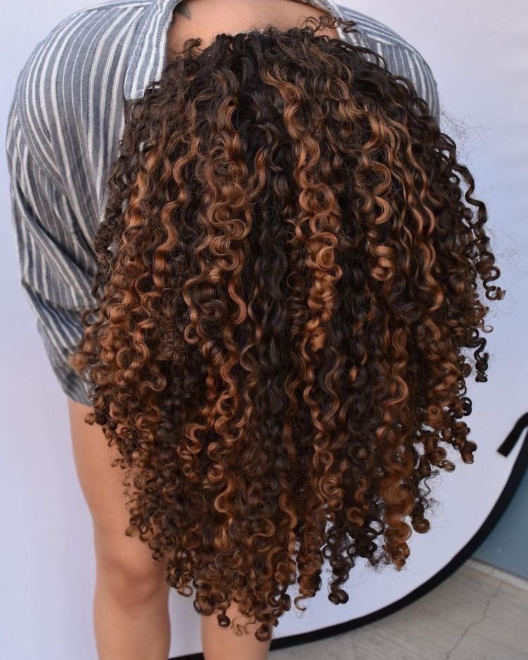 Voluminous Curly Hair Look